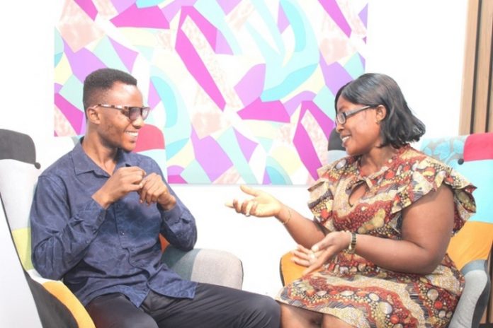 Mrs Vasty Agyeiwaa Sarkodie interacting with her hearing impaired son, Michael Gyamfi Sekyere through sign language Picture: Ernest Kodzi Mrs Vasty Agyeiwaa Sarkodie interacting with her hearing impaired son, Michael Gyamfi Sekyere through sign language Picture: Ernest Kodzi