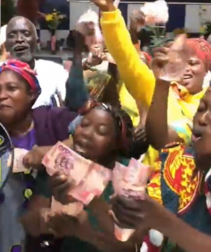 Jubilation in church as Adom Kyei-Duah fulfills promise of sharing $3m