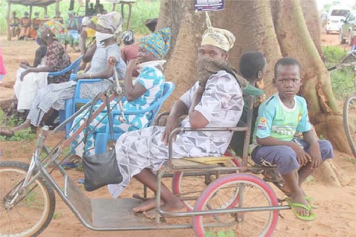 A physically-challenged woman A physically-challenged woman