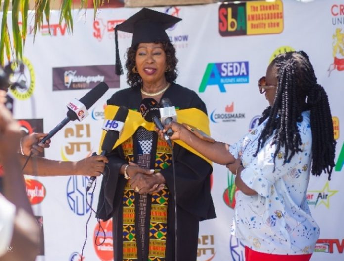 Mrs Gladys Desbordes-Hill being interviewed after her graduation Mrs Gladys Desbordes-Hill being interviewed after her graduation
