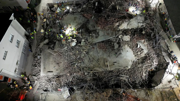 A drone view of the scene of a building collapse where several construction workers are thought to be trapped in George, South Africa May 6, 2024. Shafiek Tassiem/Reuters A drone view of the scene of a building collapse where several construction workers are thought to be trapped in George, South Africa May 6, 2024. Shafiek Tassiem/Reuters