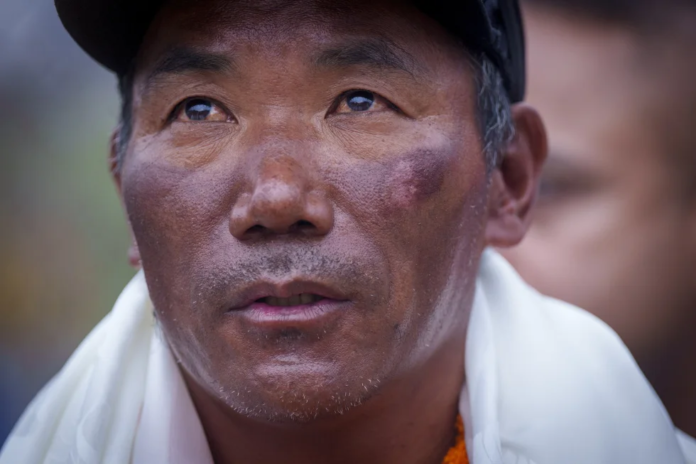 FILE- In this file photo taken on May 25, 2023, veteran Sherpa guide Kami Rita is seen arriving at the airport in Kathmandu, Nepal after scaling Mount Everest for the 28th time. Kami Rita scaled Mount Everest for a record 30th time on Wednesday, May 22, 2024, completing his second climb this month to the top of the world. (AP Photo/Niranjan Shrestha, File) FILE- In this file photo taken on May 25, 2023, veteran Sherpa guide Kami Rita is seen arriving at the airport in Kathmandu, Nepal after scaling Mount Everest for the 28th time. Kami Rita scaled Mount Everest for a record 30th time on Wednesday, May 22, 2024, completing his second climb this month to the top of the world. (AP Photo/Niranjan Shrestha, File)
