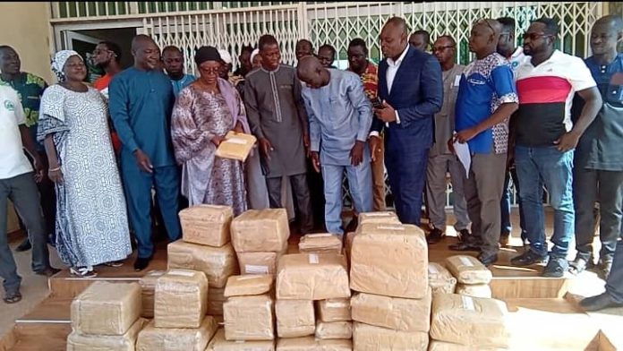 Aspiring Garu NPP PC donates mock papers to JHS ahead of BECE