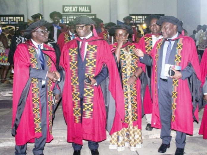 Prof. Felix Ankomah Asante (left), Pro-Vice-Chancellor, Research, Innovation & Development, UG, congratulating Prof. Daniel Frimpong Ofori (2nd from left), Provost, College of Humanities, in a conversation. Behind them are Prof. Gordon Awandare (right), Pro-Vice-Chancellor, Students and Academic Affairs, UG, and Prof. Nana Aba Appiah Amfo (2nd from right), Vice-Chancellor, UG. Picture: ERNEST KODZI