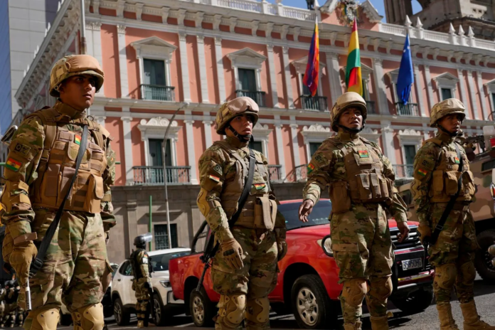 Soldiers stand guard outside the presidential palace in Plaza Murillo in La Paz, Bolivia. (AP Photo/Juan Karita)COPYRIGHT 2024 THE ASSOCIATED PRESS. ALL RIGHTS RESERVED Soldiers stand guard outside the presidential palace in Plaza Murillo in La Paz, Bolivia. (AP Photo/Juan Karita)COPYRIGHT 2024 THE ASSOCIATED PRESS. ALL RIGHTS RESERVED