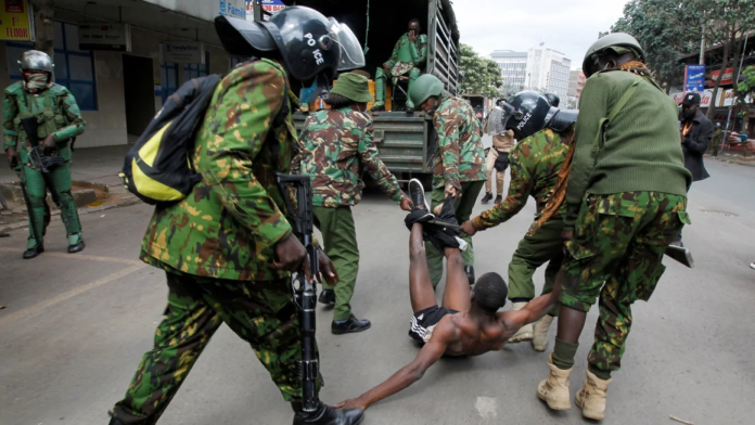 Police officers detain a man during a demonstration over police killings of people protesting against Kenya's finance bill, in Nairobi, Kenya, on June 27, 2024. Monicah Mwangi/Reuters Police officers detain a man during a demonstration over police killings of people protesting against Kenya's finance bill, in Nairobi, Kenya, on June 27, 2024. Monicah Mwangi/Reuters