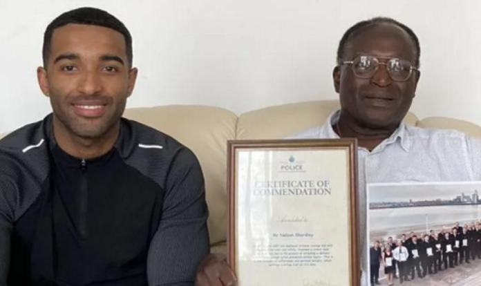 Nelson Shardey (r), seen here with his son Jacob, won a police commendation for bravery Nelson Shardey (r), seen here with his son Jacob, won a police commendation for bravery