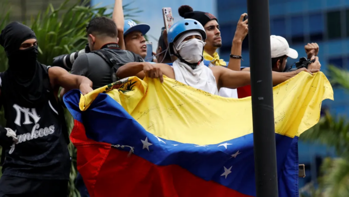 Reuters Venezuelans have been gathering in central Caracas for a second day Reuters Venezuelans have been gathering in central Caracas for a second day