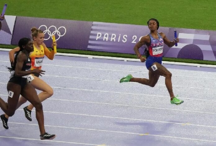 Sha’carri Richardson (USA) looks towards her competitors in the women’s 4x100m relay final during the Paris 2024 Olympic Summer Games at Stade de France Sha’carri Richardson (USA) looks towards her competitors in the women’s 4x100m relay final during the Paris 2024 Olympic Summer Games at Stade de France