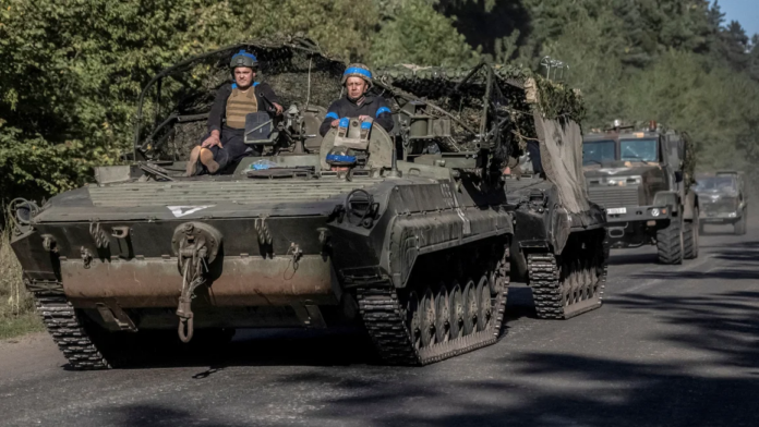 Ukrainian servicemen ride an armoured personnel carrier, near the Russian border in Sumy region, Ukraine, on Wednesday. Viacheslav Ratynskyi/Reuters Ukrainian servicemen ride an armoured personnel carrier, near the Russian border in Sumy region, Ukraine, on Wednesday. Viacheslav Ratynskyi/Reuters