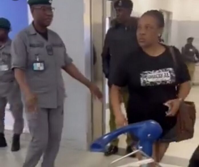 The woman destroys husband’s passport at Lagos airport