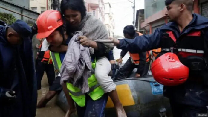 Floods and landslides kill at least 100 in Nepal