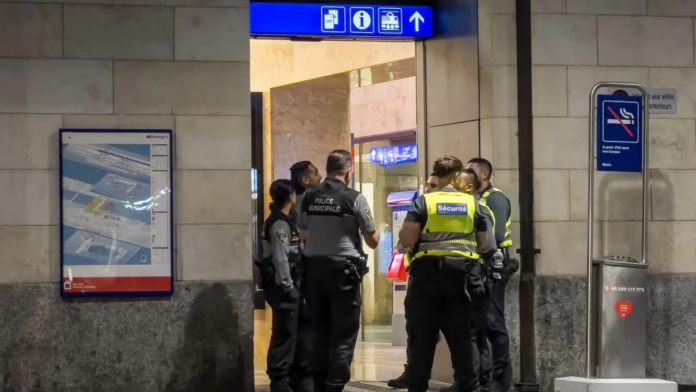 ELODIE LE MAOU/AFP The suspected killer was arrested by police at Geneva train station ELODIE LE MAOU/AFP The suspected killer was arrested by police at Geneva train station