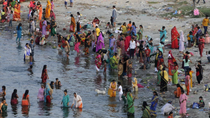 Hindustan Times via Getty Images The annual Jivitputrika festival is celebrated in several states in north-eastern India. In this 2020 photo, women and children are seen bathing in a river in the Uttar Pradesh state. Hindustan Times via Getty Images The annual Jivitputrika festival is celebrated in several states in north-eastern India. In this 2020 photo, women and children are seen bathing in a river in the Uttar Pradesh state.