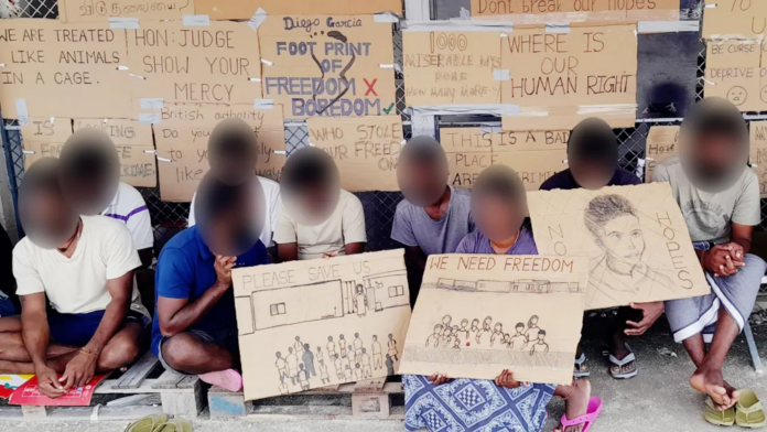 BBC "We are treated like animals in a cage" says one protest sign put up by the Tamil migrants, who cannot be identified for legal reasons BBC "We are treated like animals in a cage" says one protest sign put up by the Tamil migrants, who cannot be identified for legal reasons