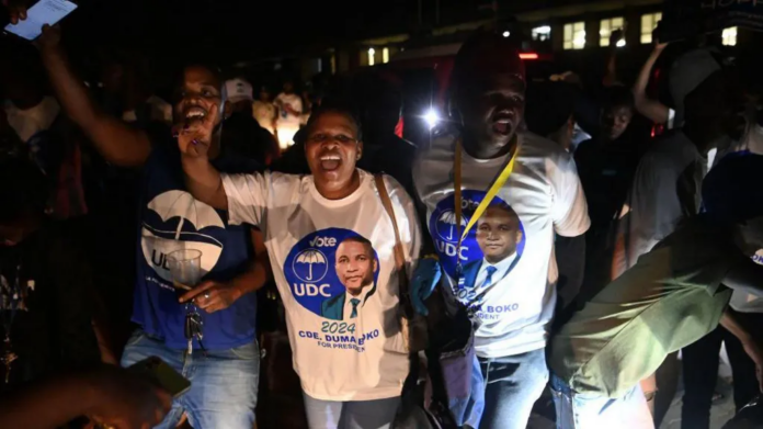 AFP | UDC supporters were celebrating as the results came in overnight AFP | UDC supporters were celebrating as the results came in overnight