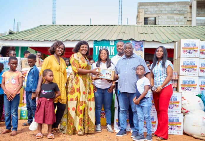 Mr Michael Abbiw presenting the items to Madam Owusu, CEO of Potter's Village Mr Michael Abbiw presenting the items to Madam Owusu, CEO of Potter's Village