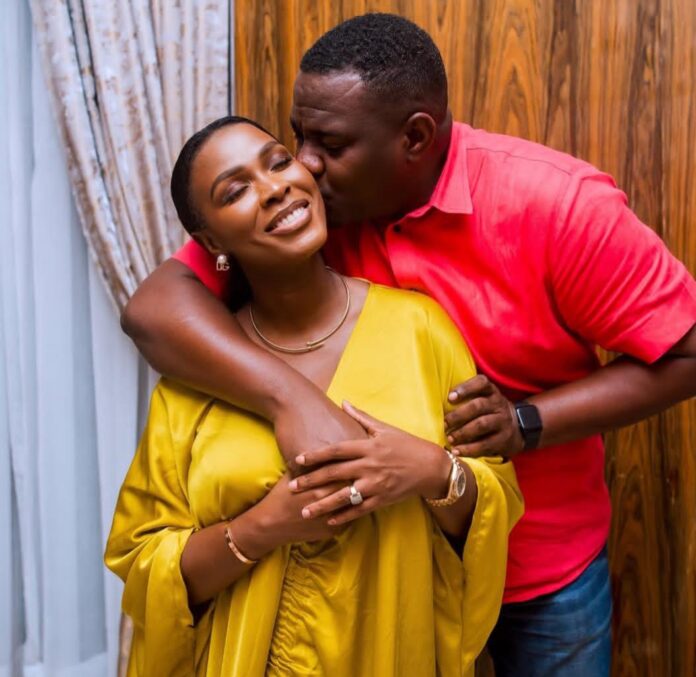 John Dumelo and wife