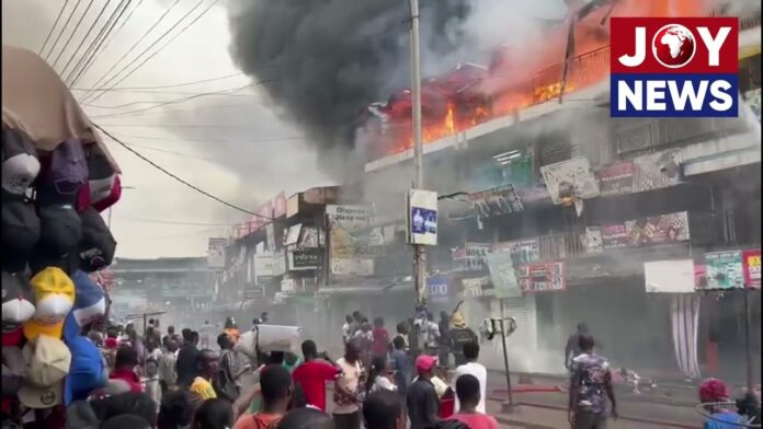 Video Thumbnail: HAPPENING NOW: Raging fire engulfs shops near Hello FM in Adum, Kumasi endangering nearby shops
