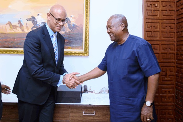 Group Chief Executive of Ecobank, Jeremy Awori with President John Mahama