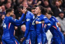 10-man Chelsea share points with Arsenal in frenetic title-chasing clash